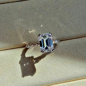 Solid 18k gold 4.5ct emerald cut moissanite ring and side moissanite